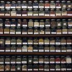 Jars of dried herbs — Stock Photo