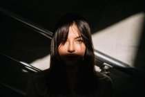 Portrait of womans face in shadow — Stock Photo