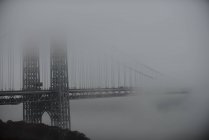Bridge into mist, USA, New York State, New York City — Stock Photo