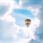 Scenic view of hot air balloon in clouds — Stock Photo