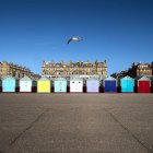 Scenic view of multi-colored row of beach huts, Brighton, England, UK — Stock Photo