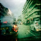 UK, London, Westminster, Knightsbridge, Taxi and car in wet weather — Stock Photo
