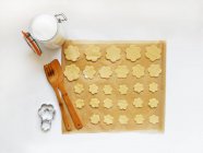 Preparing flower shaped cookies, top view — Stock Photo