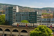 Scenic view of train and cityscape, Zurich, Switzerland — Stock Photo