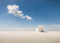 Scenic view of white armchair on the beach — Stock Photo