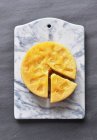 Pineapple cake on marble chopping board, top view — Stock Photo