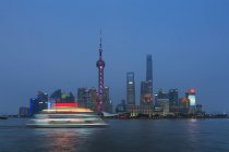 Scenic view of boat sailing past Pudong, Shanghai, China — Stock Photo