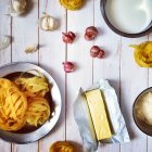 Top view of ingredients for fettuccine alfredo dish over wooden background — Stock Photo