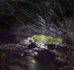 View from within a cave looking out into the daylight, Brecon Beacons National Park, Wales, UK — Stock Photo