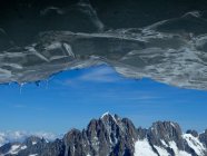 Stunning mountain panorama taken from an ice cave, Mont Blanc, France — Stock Photo