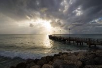 Scenic view of ocean pier on overcast day, Barbados — Stock Photo