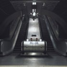 UK, London, Empty escalator in metro tunnel — Stock Photo
