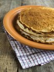 Stack of crepe pancakes on plate, closeup — Stock Photo