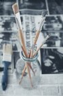 Paintbrushes collection in a glass jar, close-up — Stock Photo