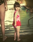 Portrait of girl at swimming baths with mother — Stock Photo
