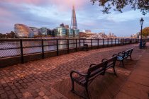 Scenic view from North Bank of River Thames looking south, waterfront with Shard skyscraper, London, UK — Stock Photo