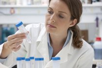 Portrait of confident mid adult caucasian woman at work in laboratory — Stock Photo