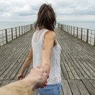 Point of view image, girlfriend leading man to adventures — Stock Photo