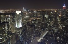 Scenic view of city at night, New York, USA — Stock Photo