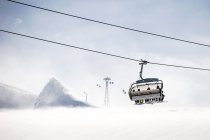 Vier Skifahrer im Sessellift, Kitzsteinhorn, Salzburg, Österreich — Stockfoto
