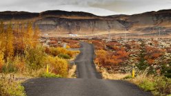 Scenic view of Road through rural landscape, Iceland — Stock Photo