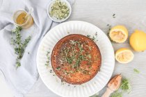 Lemon and thyme syrup cake, top view — Stock Photo