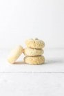 Stack of Almond macaroons over white background — Stock Photo