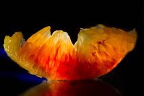 Vista ravvicinata di un segmento di frutta arancione — Foto stock