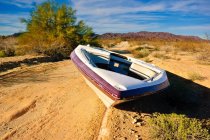 Boat abandoned on a road near Salome, Arizona, America, USA — Stock Photo