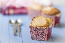 Three cupcakes with sugar, selective focus — Stock Photo