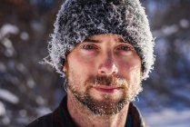 Portrait of man with frost covered face — Stock Photo