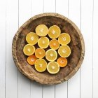 Top view, Bowl of halved oranges — Stock Photo