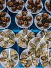 Sea urchins and oysters at the oursinades festival, Provence, France — Stock Photo