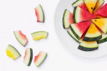 Red and yellow watermelon slices, closeup view — Stock Photo