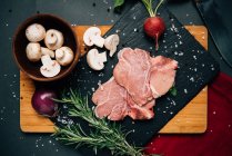 Closeup view of Veal with rosemary and mushrooms — Stock Photo
