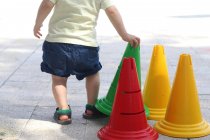 Boy playing with a cone — Stock Photo