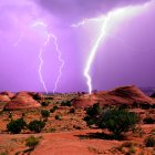 A depiction of an intense lightning storm over Arizona Mystery Valley, USA — Stock Photo