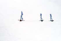 Повітряний вид на лижників та їхні тіні, Бад - Гаштайн, Зальцбург, Австрія. — стокове фото