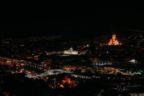 Aerial view of tbilisi cityscape at night, georgia — Stock Photo