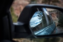 View of landscape in car wing mirror, Utah, America, USA — Stock Photo