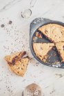 Giant cookie of freshly baked chocolate cut into triangles — Stock Photo