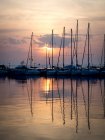 Boats moored in a harbor at sunset, Thessaloniki, Macedonia and Thrace, Greece — Stock Photo