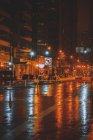 City street in the rain at night, Chicago, Illinois, America, USA — Stock Photo