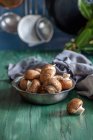 Fresh mushrooms on a kitchen worktop, closeup view — Stock Photo