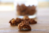 Close-up view of walnuts over table, selective focus — Stock Photo