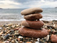 Closeup view of Stack of pebbles on the beach — Stock Photo