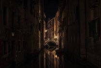 Scenic view of Venetian Canal at night, Venice, Italy — Stock Photo