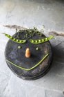 Vista close-up de legumes fazendo um rosto sorridente — Fotografia de Stock