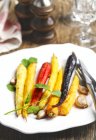 Closeup view of baked carrots on a plate — Stock Photo
