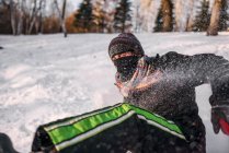 Man falling off a sledge — Stock Photo